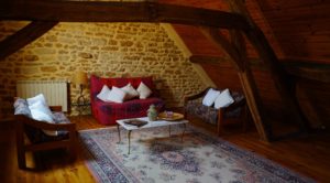 Attic sitting room with comfortable couches